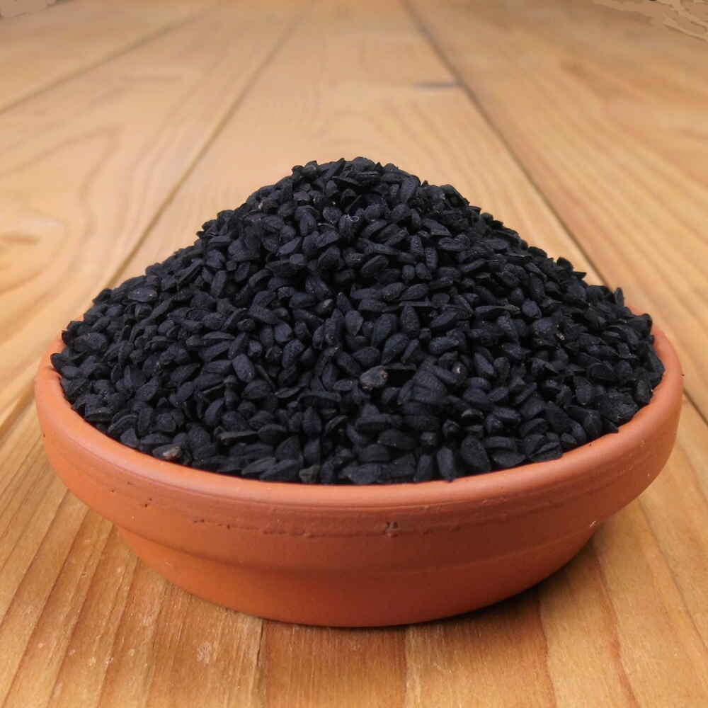 Schwarzkümmel ganz, Schwarzkümmelsamen in einer To