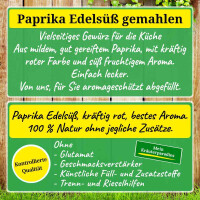 Ländlich idyllischer Bretterzaun mit zwei plakativen Textbereichen. Einmal werden die Eigenschaften und einmal die Qualität von Paprika Edelsüß gemahlen beschrieben. Der Text findet sich sinngemäß auch in der Produktbeschreibung wieder.